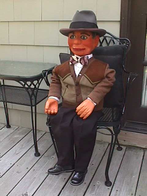 Dan Price with Theodore, Barney and Dudley, a ventriloquist figure attributed to Frank Marshall