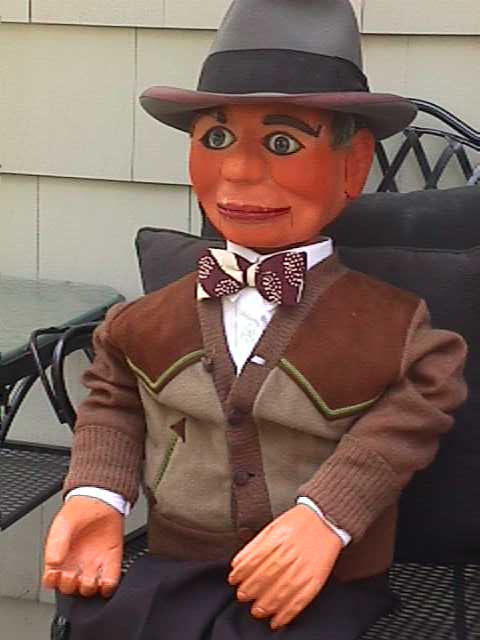 Dan Price with Theodore, Barney and Dudley, a ventriloquist figure attributed to Frank Marshall