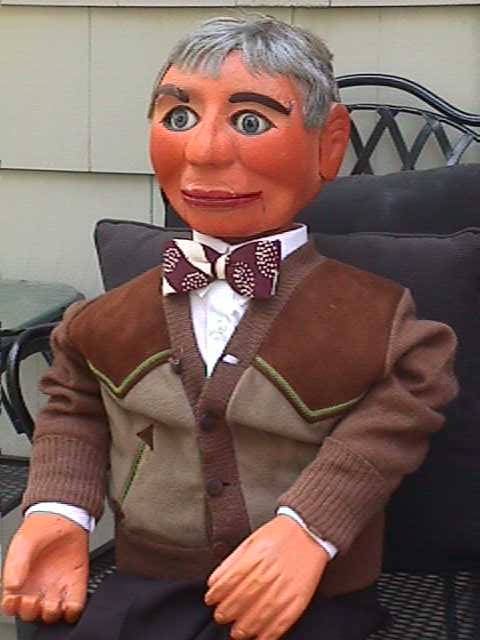 Dan Price with Theodore, Barney and Dudley, a ventriloquist figure attributed to Frank Marshall
