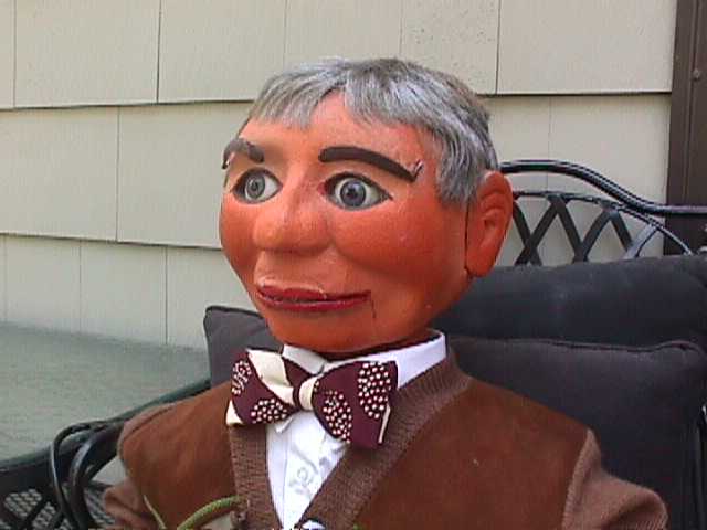 Dan Price with Theodore, Barney and Dudley, a ventriloquist figure attributed to Frank Marshall