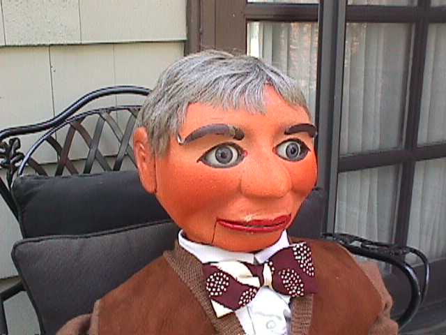 Dan Price with Theodore, Barney and Dudley, a ventriloquist figure attributed to Frank Marshall