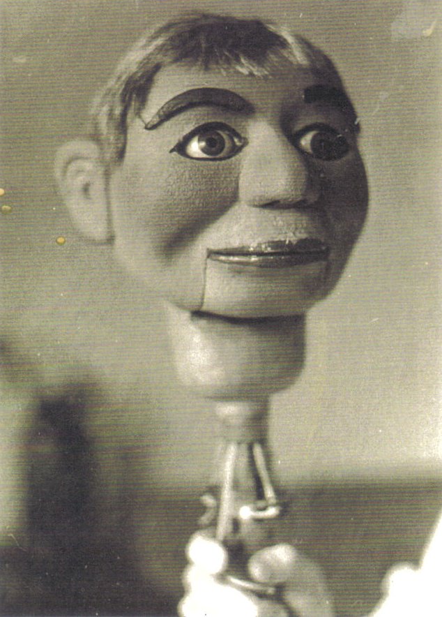 Dan Price with Theodore, Barney and Dudley, a ventriloquist figure attributed to Frank Marshall